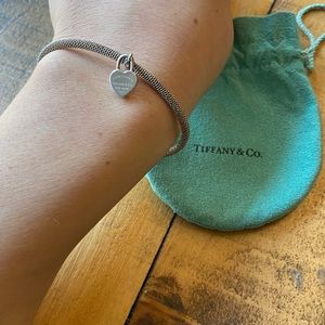 Tiffany and Co. mesh bangle with heart charm